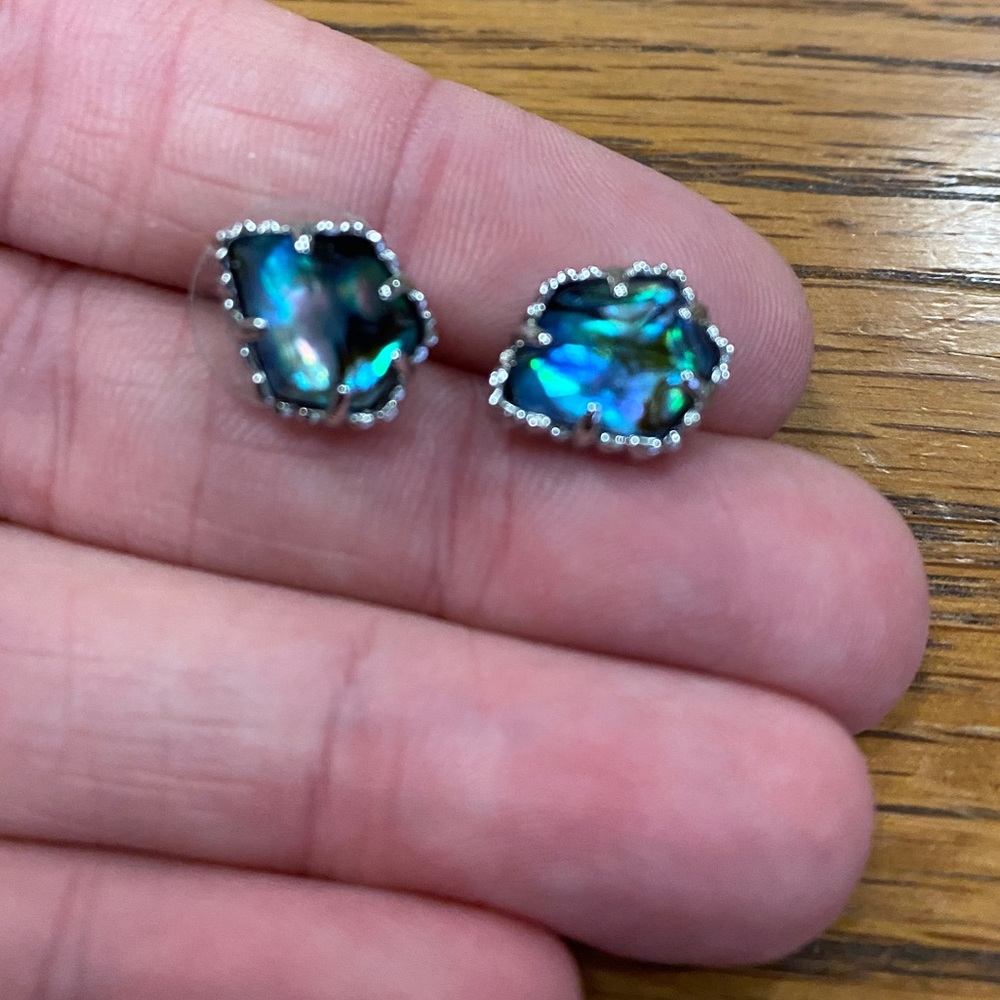 Kendra Scott Abalone stud earrings.